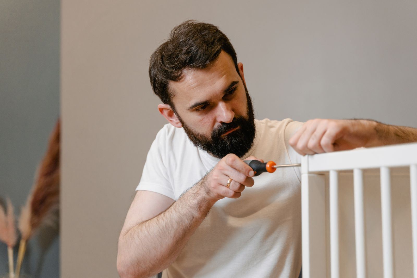 Assembling furniture with a screwdriver